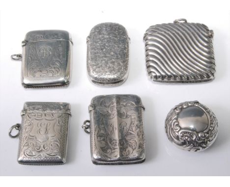 A late Victorian silver vesta case, having vacant cartouche within an all-over leaf engraved surround, maker Hilliard &amp; T