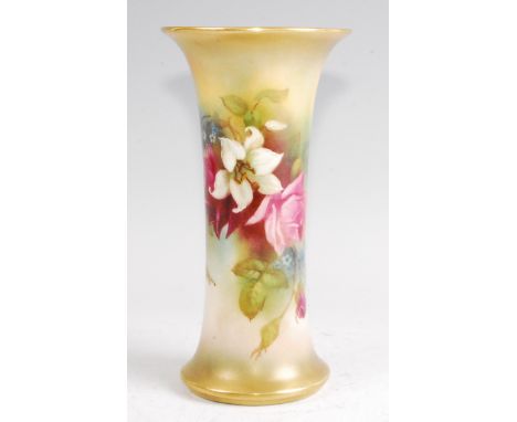 A Royal Worcester porcelain trumpet form vase, shape No.G923, decorated with roses on a shaded ground by M. Hunt, puce mark, 