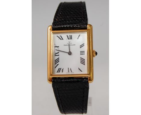 A gent's vintage Jaeger LeCoultre 18ct gold dress watch, having signed white enamel dial with Roman numerals, manual wind mov