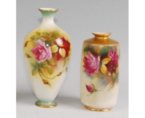 A Royal Worcester porcelain bottle vase, shape No.312, decorated with roses on a shaded ground, puce mark, h.15.5cm; together