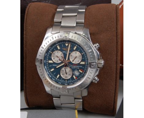 A gent's Breitling steel cased Colt chronometer, the signed blue dial having triple subsidiary dials, date aperture at 4 - 5 