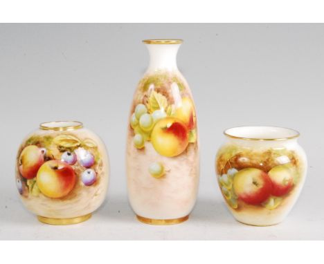 A Worcester porcelain bottle vase, shape No.2491, decorated with fruit on a mossy banks by Roberts, h.14.5cm; together with o