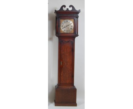 George Lumley (1723-1784) of Bury (St Edmunds) - an 18th century oak longcase clock, the 11" square brass dial signed to the 