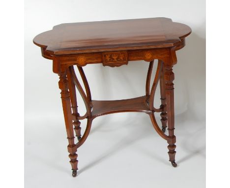 A late Victorian rosewood centre table, having mahogany inset top within marquetry inlaid surround, with further marquetry in