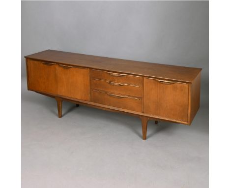 G PLAN - RETRO TEAK SIDEBOARD. A teak sideboard with a large two door cupboard, three drawers (one for cutlery) and a single 