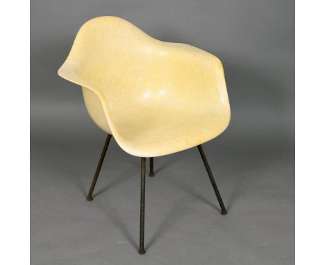 CHARLES &amp; RAY EAMES FOR HERMAN MILLER - DESIGNER 'SHELL' CHAIR. A vintage yellow fibreglass chair, supported on four meta