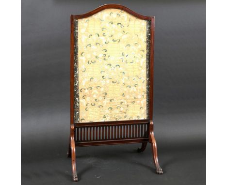 CHINESE SILK EMBROIDERED PANEL - MOUNTED AS A FIRESCREEN. A 19thc silk panel, embroidered with flowers and leaves and Chinese