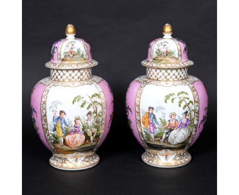PAIR OF GERMAN PORCELAIN LIDDED JARS - AUGUSTUS REX MARK. A large pair of jars with dome top lids and gilded finials, each pa