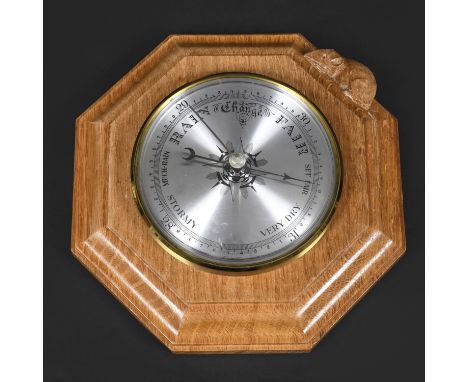 ROBERT THOMPSON OF KILBURN - MOUSEMAN BAROMETER. An oak cased octagonal barometer, with a silvered dial and carved 'Mouse' on