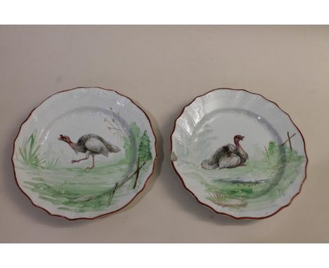 SET OF FRENCH POTTERY PLATES - BIRDS. A set of six plates, each painted with a variety of birds and foliage including Chicken