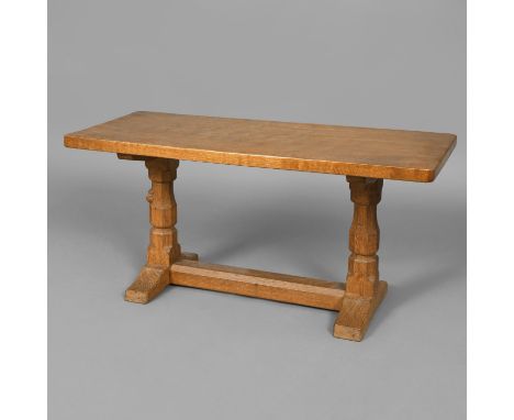 ROBERT THOMPSON OF KILBURN. ROBERT THOMPSON OF KILBURN - MOUSEMAN COFFEE TABLE. An oak coffee table with a rectangular adzed 