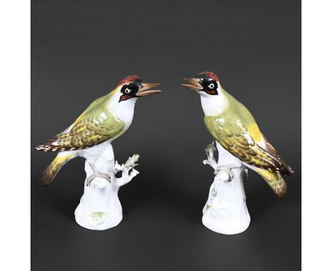 TWO MEISSEN WOODPECKERS. Two similar 20thc models of Green Woodpeckers, each naturalistically painted and perched on a tree s