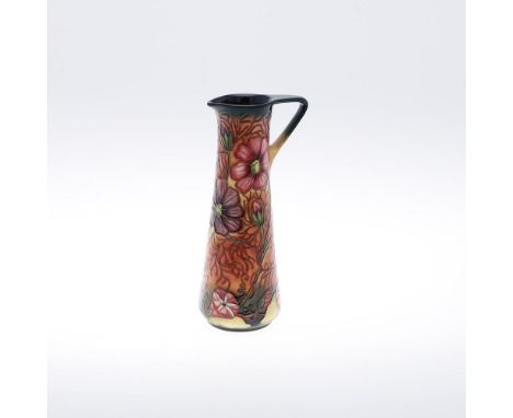 MODERN MOORCROFT JUG - COSMOS. A slender jug in the Cosmos design, designed by Rachel Bishop and dated 2000. Marked, 'Moorcro