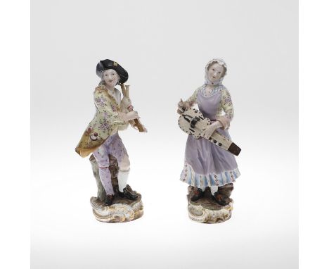 A PAIR OF MEISSEN FIGURES OF MUSICIANS. A large pair of late 19thc porcelain figures, the lady and gent holding bagpipes and 