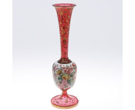 LARGE BOHEMIAN GLASS VASE. A large slender bohemian glass vase, the top section and base in ruby glass with gilded floral spr