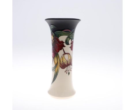 MODERN MOORCROFT VASE - ANNA LILY. A slender vase in the Anna Lily design, designed by Nicola Slaney. Marked 'Moorcroft, Made