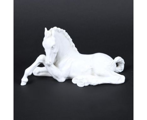 MEISSEN PORCELAIN HORSE. A 20thc white porcelain figure of a horse in a lying down position. 'Meissen Crossed Swords' mark an
