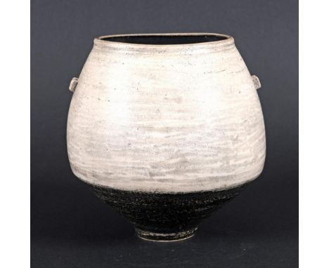 JASON WASON (B 1946) - LUGGED VASE. (d) The pottery vase with a smooth white top section with lugs to each side, the bottom s