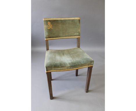 GEORGE VI CORONATION CHAIR. A limed oak chair with blue velvet upholstery, with a cypher for King George VI. Stamped undernea