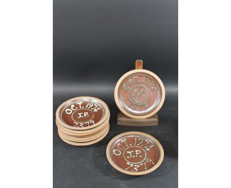 MUCHELNEY POTTERY - SET OF NINE PLATES, 1974. A set of nine stoneware plates (23cms diameter), each marked 'Oct 1974, J.P, 73