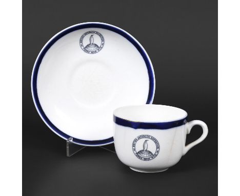 BRITISH ANTARCTIC EXPEDITION 'TERRA NOVA' - CUP & SAUCER BY DUNN BENNETT & CO. A rare matching earthenware cup and saucer, ma