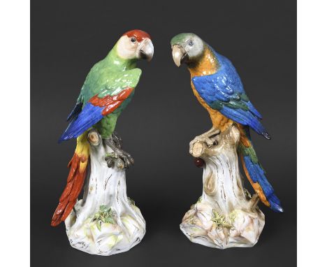 TWO MEISSEN PORCELAIN PARROTS. Two late 19thc large porcelain Macaw's, each brightly painted and perched on a tree stump with