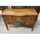 Edwardian mahogany semi bow front inlaid desk, central bow fronted drawer flanked by 2 short drawers
