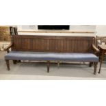 Late 19th cent. Pine bench tongue and groove back, scroll arms, upholstered seat on three turned