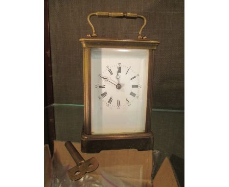 A striking Carriage clock 12cm tall  