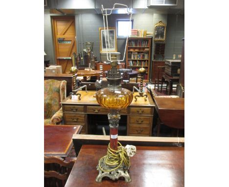 An oil lamp and two others converted to electricity, 86 cm high  