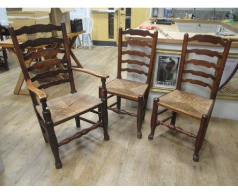 A harlequin set of eight ash ladder back dining chairs with rush seats, including two elbow chairs (8)  