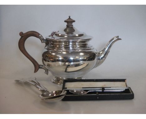 A silver teapot, pair of George III table spoons and a cased teaspoon  