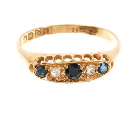 Antique 18ct gold sapphire and diamond five stone ring with three round mixed cut blue sapphires and two old cut diamonds in 