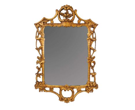 Mid 18th century carved giltwood wall mirror, in the Chinese Chippendale style, the shaped plate in pierced C-scroll frame, 8