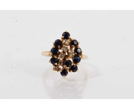 Diamond and sapphire cluster ring with an asymmetric cluster of single cut diamonds and round mixed cut sapphires on 18ct gol