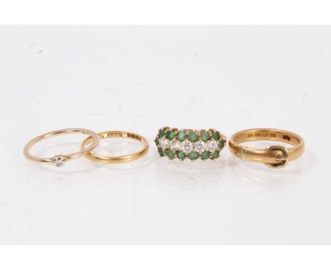 Four gold rings to include a 22ct gold buckle ring, 18ct gold wedding ring and two 9ct gold dress rings (4)22ct buckle ring h