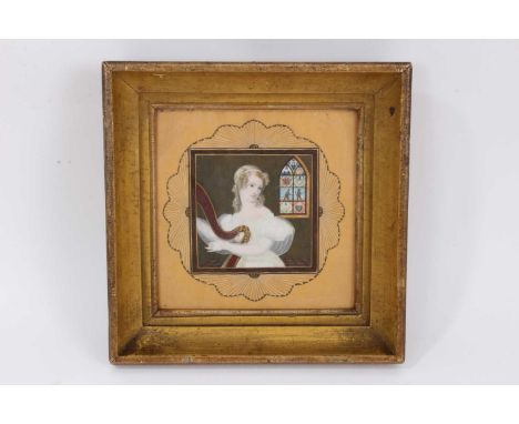 Unusual 19th century portrait miniature, painted with a young female harpist in an interior, stained glass window beyond, in 