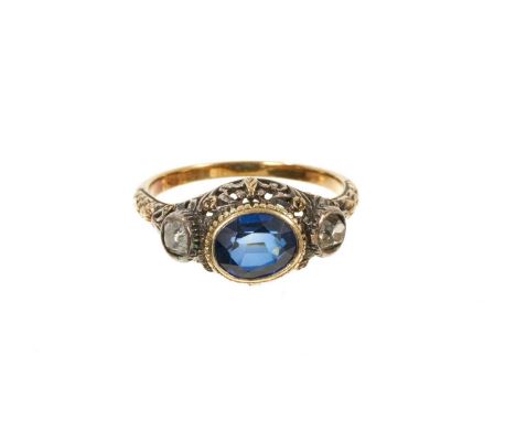 Antique French blue sapphire and diamond three stone ring with an oval mixed cut blue sapphire measuring approximately 7.5mm 