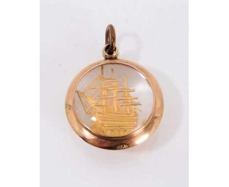 Victorian 9ct gold fob with an engraved and pierced gold image of HMS Victory in double-sided glazed gold pendant mount, Birm