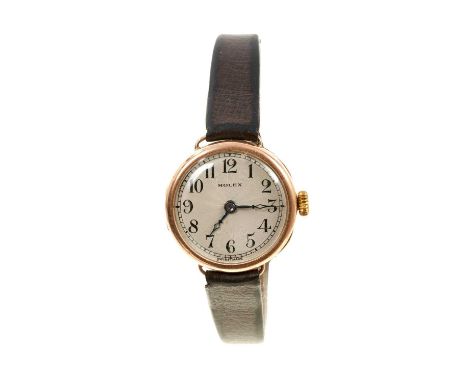 1920s Rolex gold wristwatch with Rolex 15 jewel movement, the circular engine turned dial with black enamel Arabic numerals i