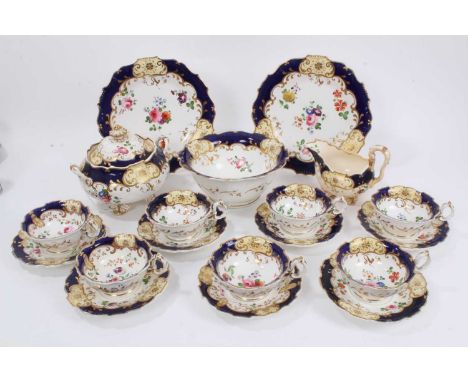 Victorian floral painted part tea set on cobalt and gilt groundThe bowl has a light hairline. The cream jug is cracked and st