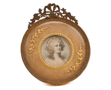 Good quality Victorian ormolu mounted photo frame, of glazed circular form, with pierced ribbon surmount and easel support, h