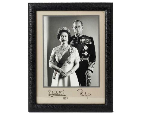 H.M.Queen Elizabeth II and H.R.H. The Duke of Edinburgh, fine signed presentation portrait photograph of the Royal couple wea