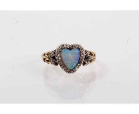 Late Victorian opal and diamond heart shape ring with a heart-shape opal surrounded by a border of old cut and rose cut diamo