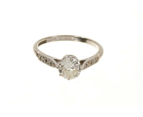 Diamond single stone ring with an old cut diamond estimated to weigh approximately 0.75cts in claw setting with further diamo