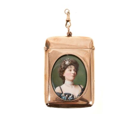 Large and good quality Edwardian yellow metal vesta case with inset enamelled portrait miniature depicting a wealthy elegant 