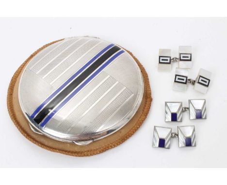 1930s Art Deco style silver and enamel powder compact of circular form, with engine turned decoration and blue and black enam
