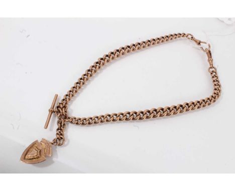 Edwardian 9ct rose gold watch chain with solid curb links individually hallmarked, and a 9ct rose gold fob, 44cm length.A sub