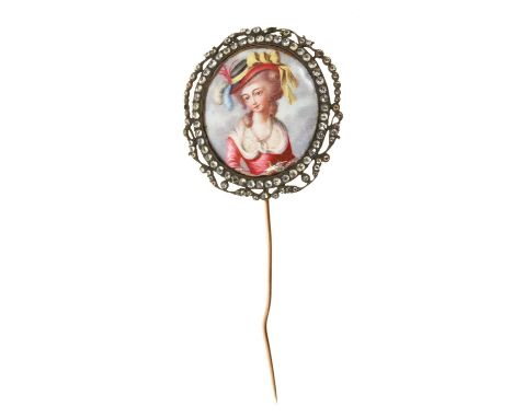 18th century enamel portrait miniature depicting a lady holding a bird, the oval enamel panel within a frame set with rose cu