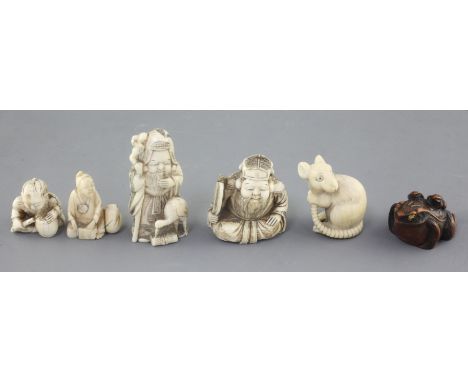 Five Japanese ivory netsuke and a similar boxwood example, late 19th / early 20th century, comprising the figures of Fukoruku